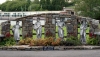 Sequence of statues depicting the Four Seasons with the Town Park and Boys National School in the background.